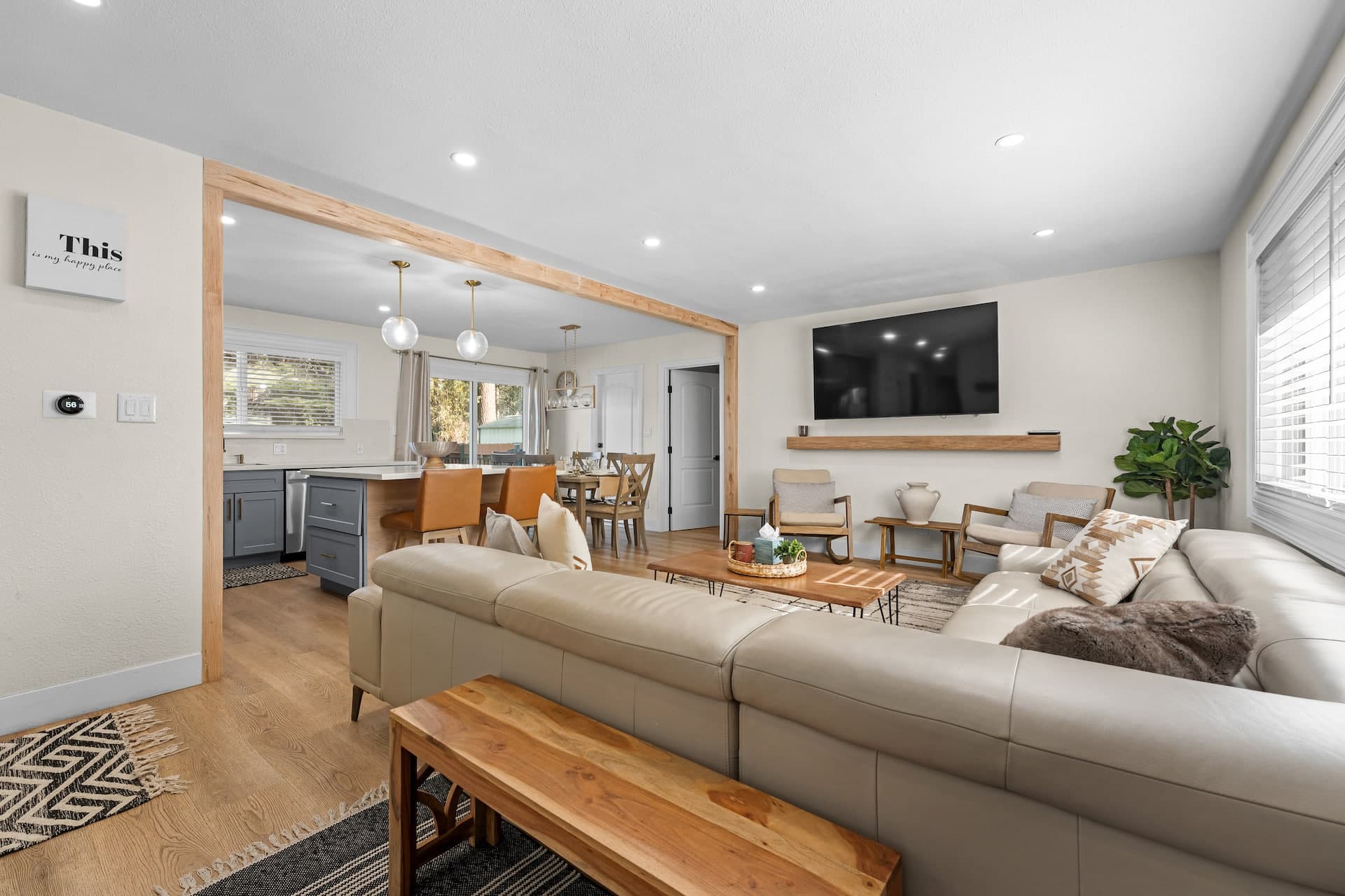 Bright great room with living, kitchen, and dining at the South Lake Tahoe home (photo 5)