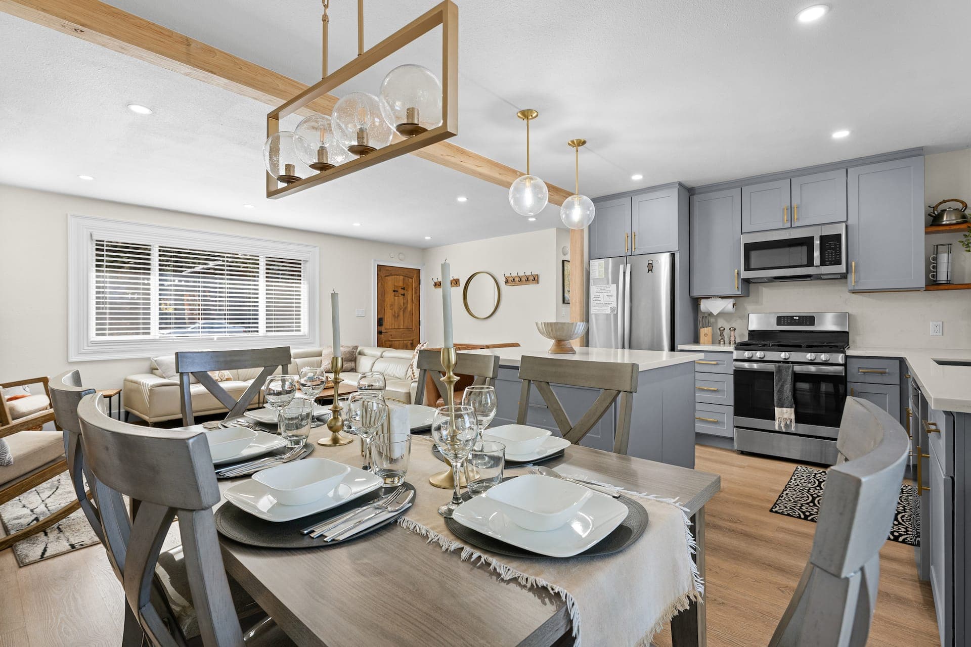 Bright great room with living, kitchen, and dining at the South Lake Tahoe home (photo 2)